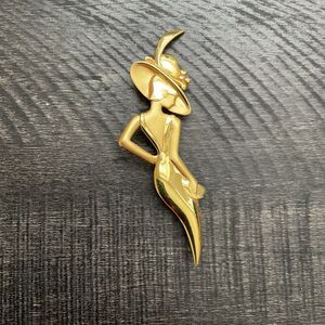Vintage Lady Remington, Gold-tone Lady in Hat Brooch. Signed. ~3.5” x 1.25”.